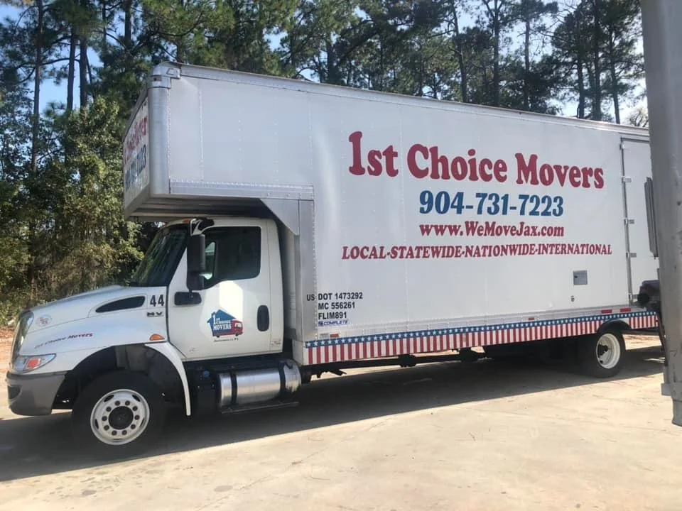 1st Choice Movers moving truck parked outside